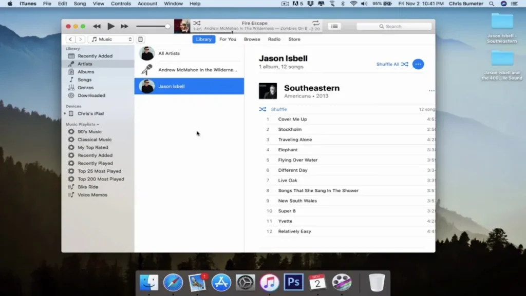 Screenshot of the iTunes desktop application displaying a music library with an artist and album selected